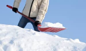 Removing,Snow,With,A,Shovel,After,Snowfall