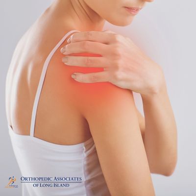 OALI LP (7) A person in a white tank top holding their left shoulder, which is highlighted with a red glow, indicating pain or discomfort Logo of Orthopedic Associates of Long Island is visible