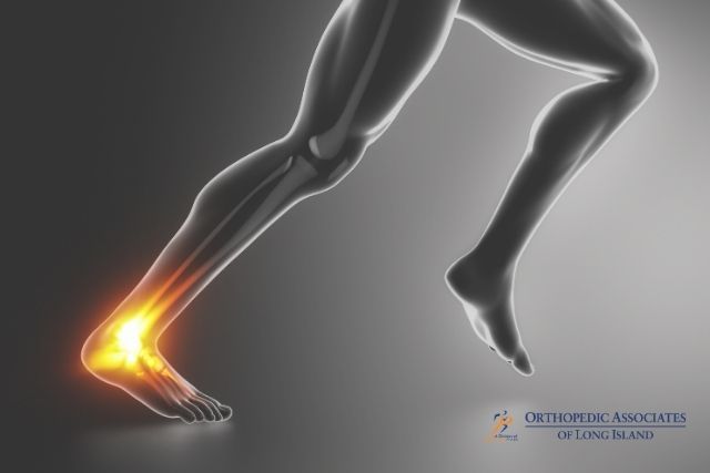 OALI LP (11) Illustration of a human lower leg and foot with the ankle highlighted in orange, indicating pain or injury; Orthopedic Associates of Long Island logo in the corner